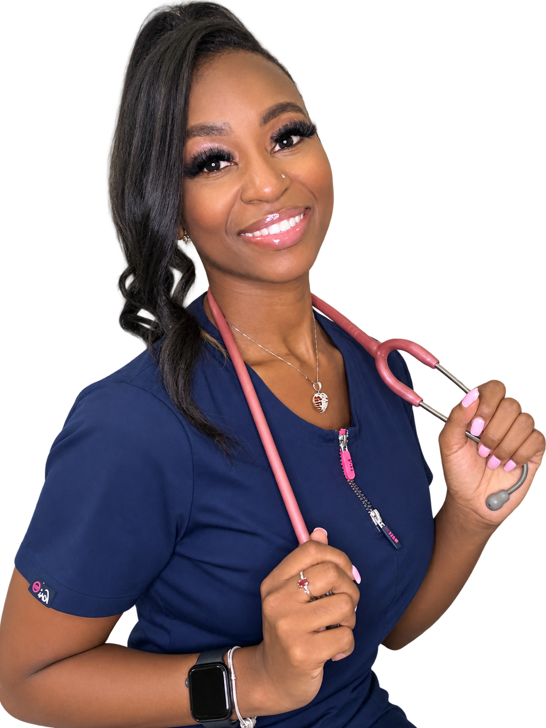 Ashley in navy nursing scrubs with a pink stethoscope